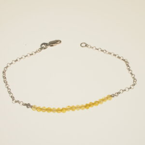 Bracciale di catena rolò rodiata con centro di zirconi sintetici gialli infilati in filo rigido cm 18